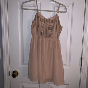 Beige dress with beaded detail